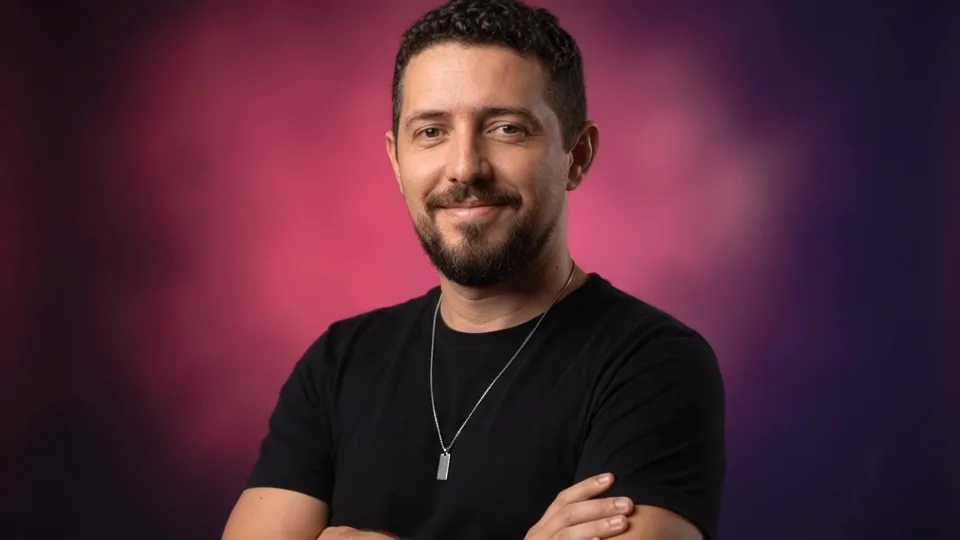 Michael, web designer, smiling with arms crossed
