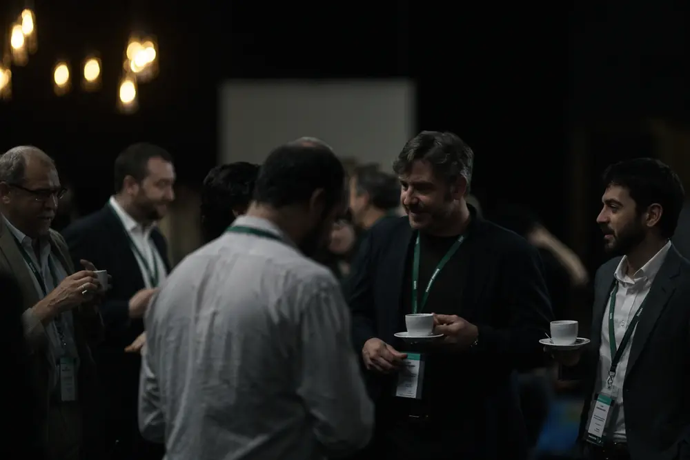 Members chatting at the coffee break